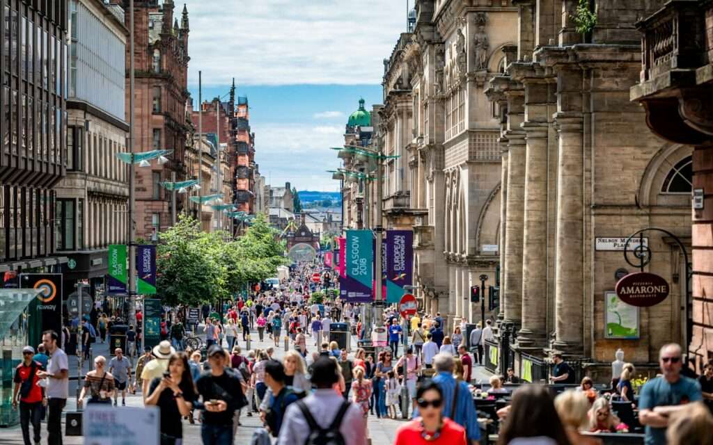 Crowds on Buchanan Street in Glasgow on a sunny day