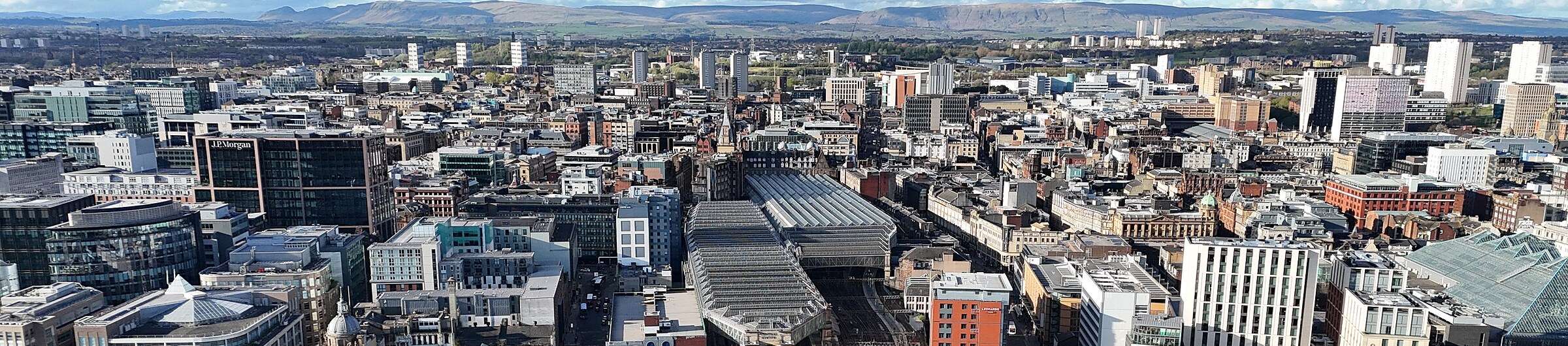 Glasgow from the air, with the glass roof of Central Station and the city centre beyond the Clyde